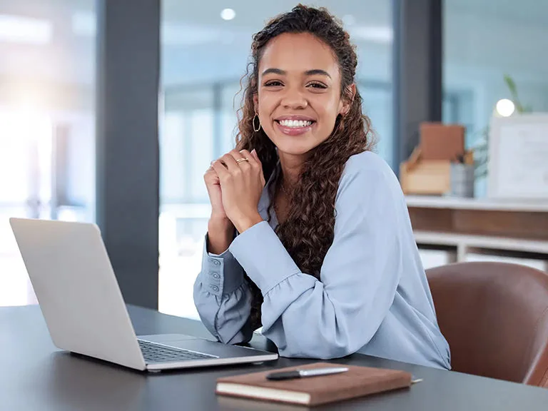 Female employee smiles 