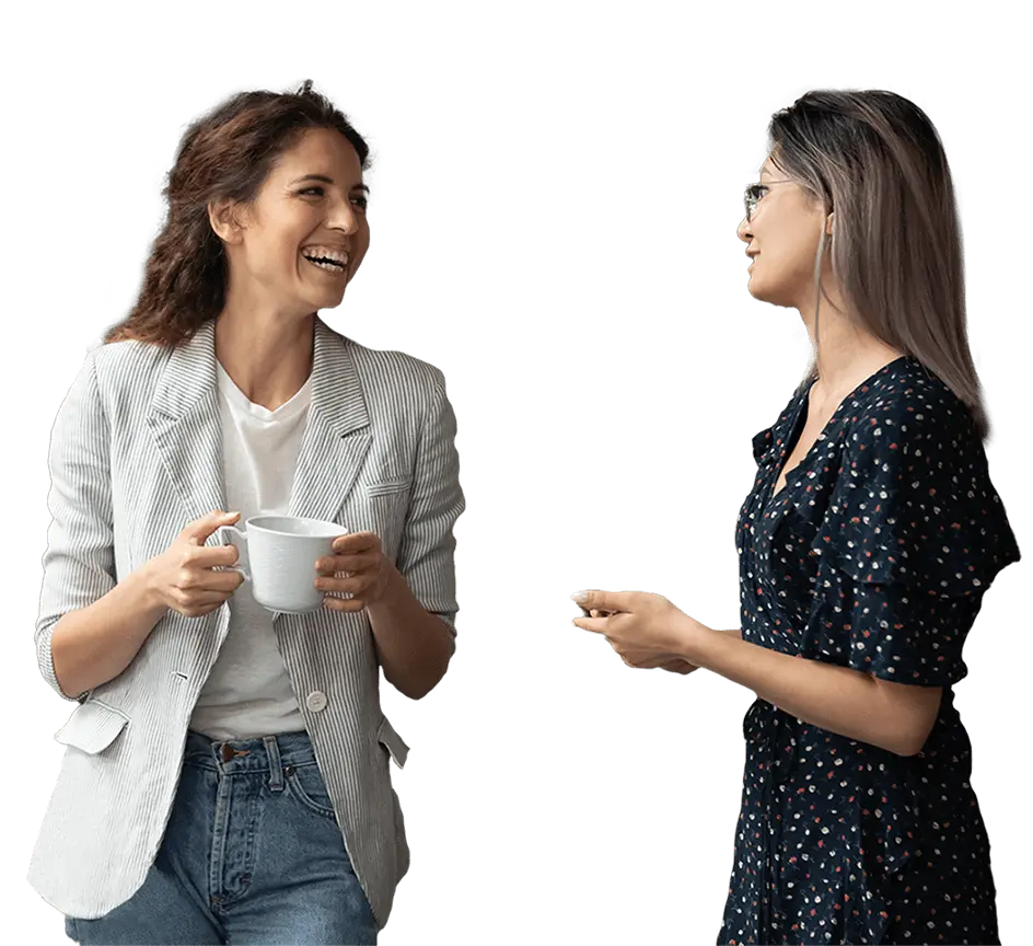 Two female employees talking to each other